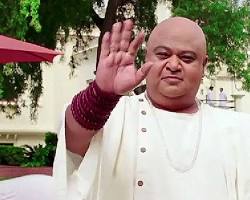 Image of Saurabh Shukla as Tapasvi Maharaj in PK movie