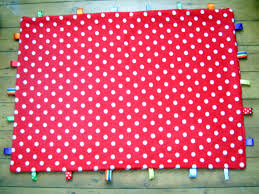 Résultat de recherche d'images pour "taggy blanket"