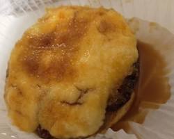 Image of someone looking longingly at a Bojangles biscuit