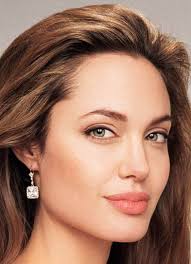 UK – Women who have plump full lips look younger than their years, scientists have said. It is something devotees of collagen injections and silicone ... - angelina_jolie_lips2