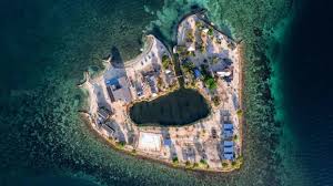 Ancien joueur NBA transforme une île privée en paradis à Belize!