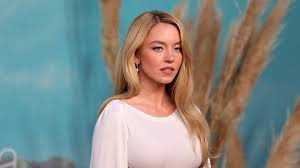 Sydney Sweeney kicks off Stagecoach weekend with duet alongside Bailey Zimmerman as lingerie war heats up