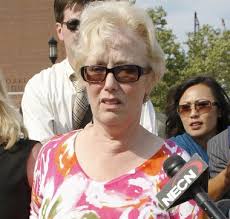 File photo by Bizuayehu Tesfaye / Associated PressMargaret McCusker leaves federal court in Boston last summer where a hearing was held for her sister ... - 11175108-large