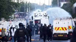 Belfast Unrest: Water Cannon Deployed Amid Anti-Immigrant Protests Following Knife Attack