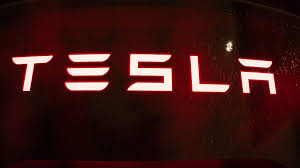 Tesla profits soar as Elon Musk bets big on robotaxis and AI
