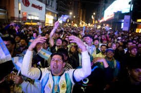 Licensable picture: Argentina fans watch Jordan match on outdoor screen in Buenos Aires
