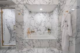 A whole lotta marble! Designers weigh in on Trump’s Lincoln Bathroom reno.