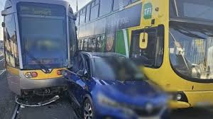 Traffic disruption after collision between car, Luas and bus