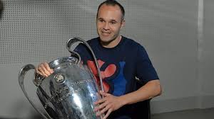 Image result for PIC OF INIESTA WITH TROPHY