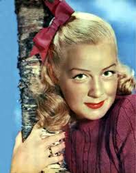 This is such an adorable picture of Betty Hutton. Yeah, it made me, a grown woman, put in a bow in my hair. Here&#39;s what I did to get a similar 1940′s ... - betty_hutton_bow