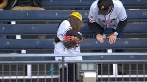 Young Pirates fan gives away a ball, gets a heart-melting hug in exchange