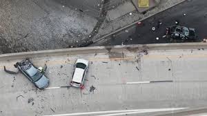 2 killed in violent 5-car crash that sends car off ramp