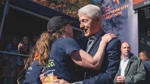 Bill Clinton Spotted with Bandage at NYC Marathon, Cheering on Daughter Chelsea