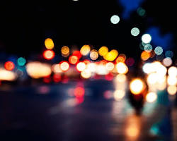 busy street at night with some blurred lightsの画像