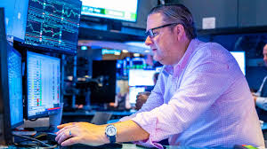 Traders react as technology stocks fall during a major stock market sell off