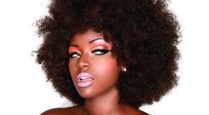 Amara La Negra was born Amara Santos and raised in Miami, Florida to a Dominican mother who entered the U.S. through the Mexican border. - Amara-La-Negra-04