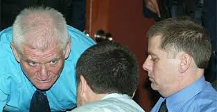 James Monaghan (left), Martin McCauley and Niall Connolly talk before their trial in Bogota, Colombia. Photograph: Javier Galeano/AP - men3