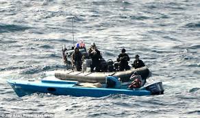 Image result for images of gun men with speedboat