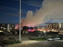 Fire in Granary District sends up plume of black smoke over downtown Salt Lake City