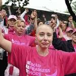  Despite rain, thousands of runners, walkers turn out for Race for the Cure