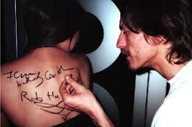 Ben Daglish is here caught in the act of using Kate&#39;s eye-liner to sign Letitia&#39;s back! - bennandletitia
