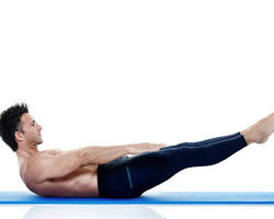 Image of person doing pilates exercises on a yoga mat