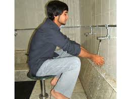 Image result for picture of man doing ablutions before prayers