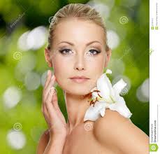 Beauty face of young beautiful woman with flower - beauty-face-young-beautiful-woman-flower-31701119