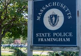 Another Mass State Police trooper suspended with pay after he was charged with stealing Bobcat excavator