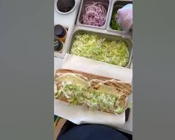 Subway sandwich with salad chicken and avocadoの画像