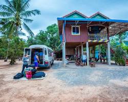 A traveler staying with a local family in a Cambodian homestay