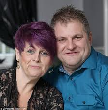 Amanda, following her pioneering operation to remove excess skin, with her partner Brian Minchin - article-2242182-1653B6CB000005DC-895_634x641
