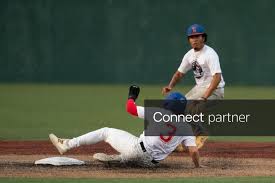 Licensable picture: Ridgeland Roosters player Conner Simpson (3) slides safely into second base during the first ever Legacy League game against the
