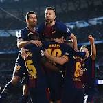 Barca move points clear Real