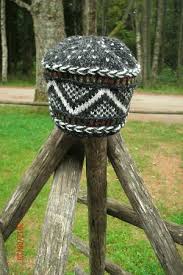 This Latvian woman knits hats from original designs, and sells ... - latvian-ethnographic