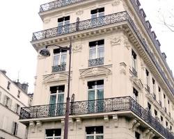 Image de façade immeuble haussmannien copropriété syndic dératisation extérieur urbain luxueux