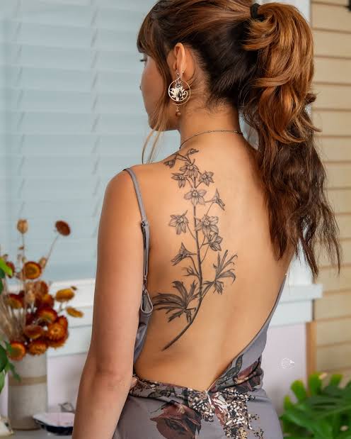 Elegant and timeless botanical tattoos- A fully healed larkspur ...