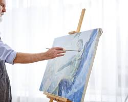 Image of person painting a picture