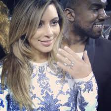 Kanye Proposes with a 15-carat Ring &middot; Kanye Proposes with a 15-carat Ring. Minjae Kang, Staff Writer October 23, 2013. Filed under Arts &amp; Entertainment - ccb9390f-91b8-4052-ab69-f2e33295d720_KimKardashian_KanyeWest_Ring_102213