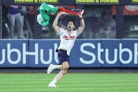 Fan runs onto Yankee Stadium field waving Palestinian flag at 9:11 p.m. on 9/11 anniversary - The Athletic — The New York Times