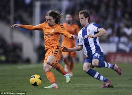 Top form: Luka Modric (right), beating Espanyol&#39;s Alex Fernandez has been on United&#39;s list long term - article-2539733-1A99502500000578-109_634x461