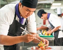 Image of Chef teaching a cooking class in Cambodia