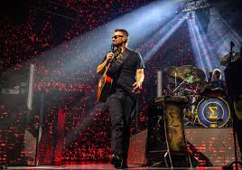 Eric Church captivating his fans during a live concert performance