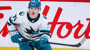 Macklin Celebrini wearing the San Jose Sharks jersey