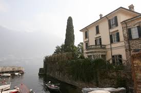 George Clooney, Amal, and Their Twins Coordinated Head to Toe in White and Yellow for a Day on Lake Como