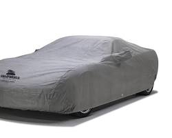 Image of car covered in a dust sheet