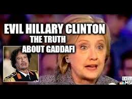 Image result for hillary clinton with gaddafi son