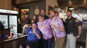 Montana law enforcement and Special Olympics athletes team up for Tip-A-Cop fundraiser; $2 from each Guardian pizza sold at Mackenzie River goes to the cause