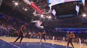 Jordan Clarkson rises for a two-handed jam