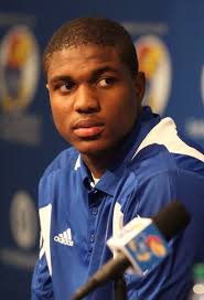 Receiver Justin McCay, a transfer from Oklahoma, listens as his teammates answer questions on Monday, Jan. 16, 2012 at the Anderson Family Football Complex. ... - ku_fbc_presser04_t341x500